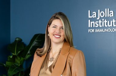 Portrait photo of Dr. Erica Ollmann Saphire in her office